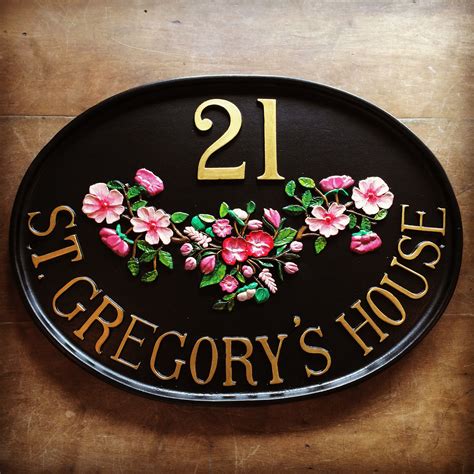 custom cast metal house signs